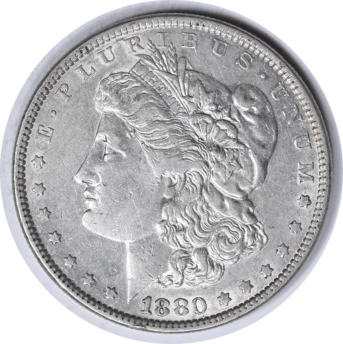 1880 VAM 39A Morgan Silver Dollar AU Uncertified 90% Silver Coin: 1880 VAM 39A Morgan Silver Dollar AU Uncertified 90% Silver Coin This 1880 VAM 39A Morgan Silver Dollar is a classic collectible coin, featuring a striking design by George T. Morgan. The coin is comp