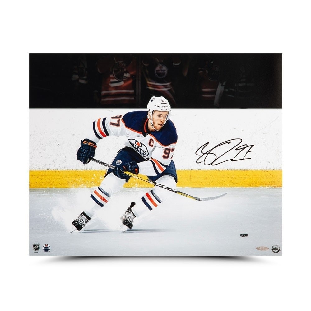 Connor McDavid Autographed 16x20 Photo Upper Deck Oilers: Connor McDavid Autographed 16x20 Photo Upper Deck Oilers This is a striking autographed 16X20 photo of Connor McDavid, showcasing him in a memorable moment known as "Snow the Cameraman" while playing 