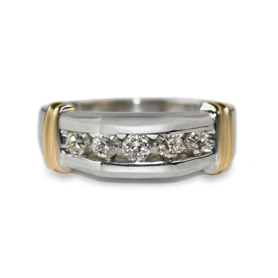 Men's 14K Two Tone Diamond Channel Set Band 0.50 ct: Men's 14K Two Tone Diamond Channel Set Band 0.50 ct This men's wedding band is crafted in 14k two-tone gold, featuring both white and yellow gold elements. The ring is channel-set with five round bril