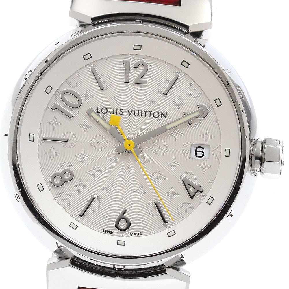 Louis Vuitton Tambour Hologram Q1313 Quartz Ladies Watch: Louis Vuitton Tambour Hologram Q1313 Quartz Ladies Watch This Louis Vuitton Tambour Hologram Date Quartz ladies watch features a stainless steel case and a leather strap. The watch has a silver dial a