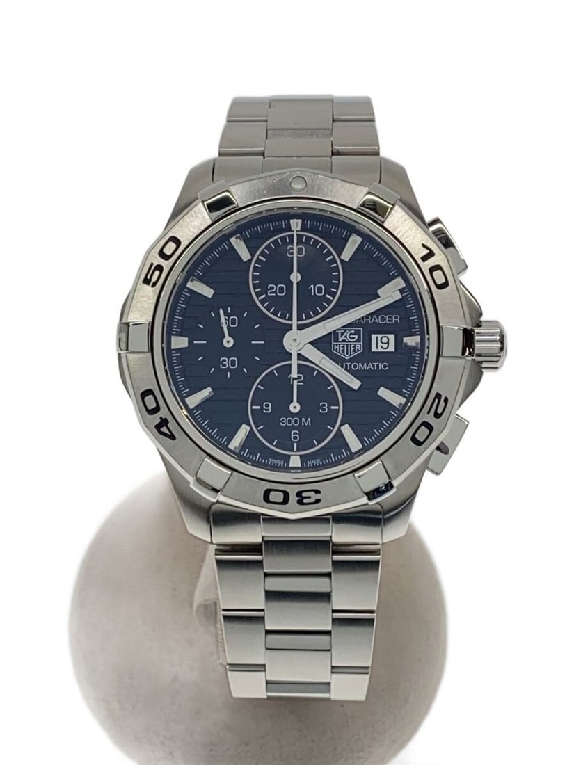 TAG Heuer Aquaracer men's chronograph wristwatch: TAG Heuer Aquaracer men's chronograph wristwatch This TAG Heuer Aquaracer Chronograph men's wristwatch features a Swiss-made design and construction. The watch is pre-owned and shows slight signs of u