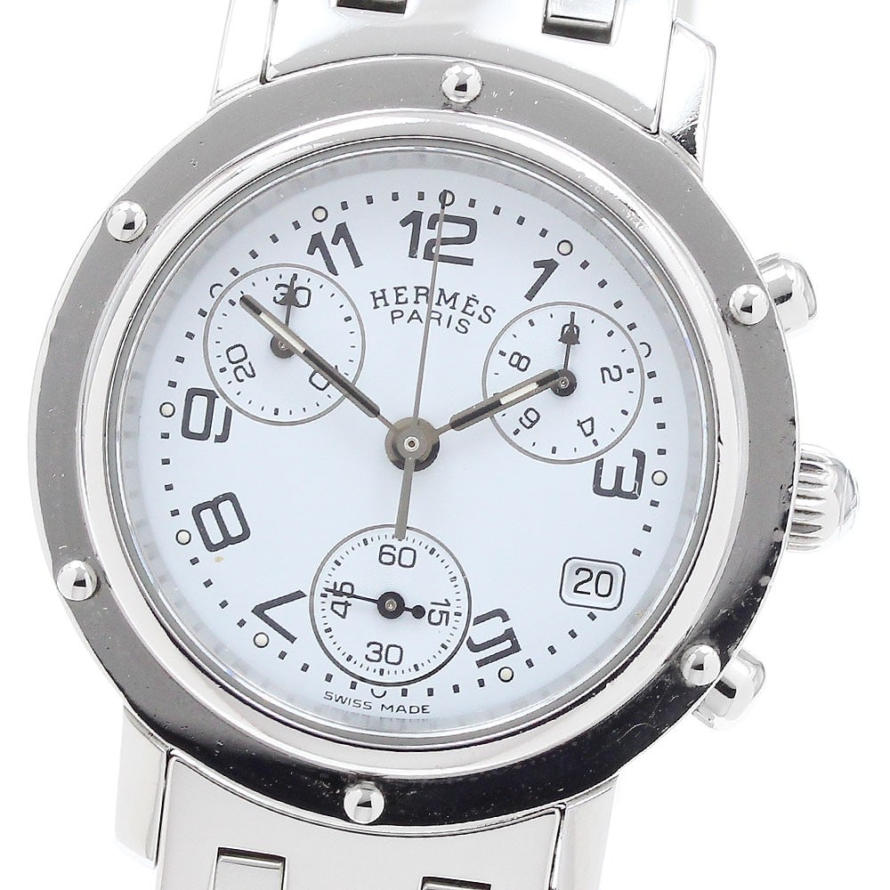 Hermes Clipper Chrono CL1.310 Quartz Ladies Wristwatch: Hermes Clipper Chrono CL1.310 Quartz Ladies Wristwatch This HERMES Clipper Chrono Date Quartz women's wristwatch features a stainless steel case and bracelet with a white dial. It offers chronograph, 