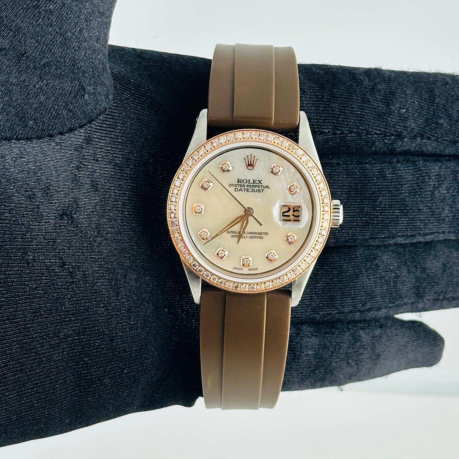 Datejust Ref 1601 Rolex Watch Aftermarket White MOP Rose Diamond Dial Rubber Strap: Datejust Ref 1601 Rolex Watch Aftermarket White MOP Rose Diamond Dial Rubber Strap This is a men's Rolex Datejust watch, reference number 1601. It features an aftermarket white mother-of-pearl and ros