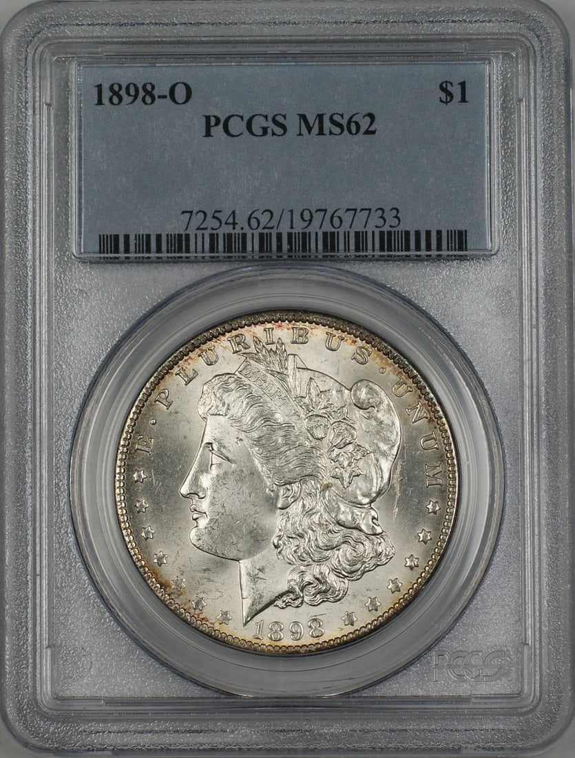 PCGS MS62 1898-O Morgan Silver Dollar New Orleans Mint Light Toning: PCGS MS62 1898-O Morgan Silver Dollar New Orleans Mint Light Toning This 1898-O Morgan Silver Dollar is graded MS-62 by PCGS and features light toning. Struck at the New Orleans Mint, this uncirculate