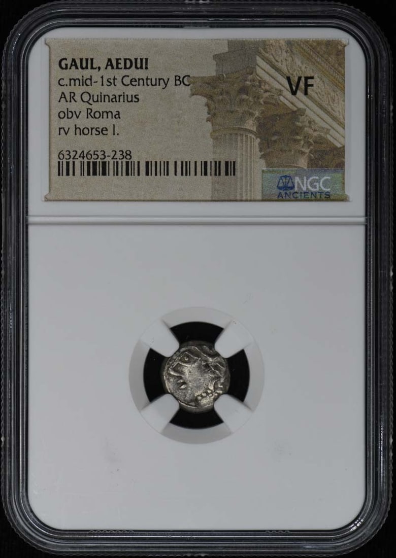 Aedui Quinarius Silver Coin circa Mid 1st Century BC Certified by NGC: Aedui Quinarius Silver Coin circa Mid 1st Century BC Certified by NGC This is a pre-owned AR Quinarius coin from the mid-1st century BC, originating from the Gaulish Aedui tribe. The coin has been cer