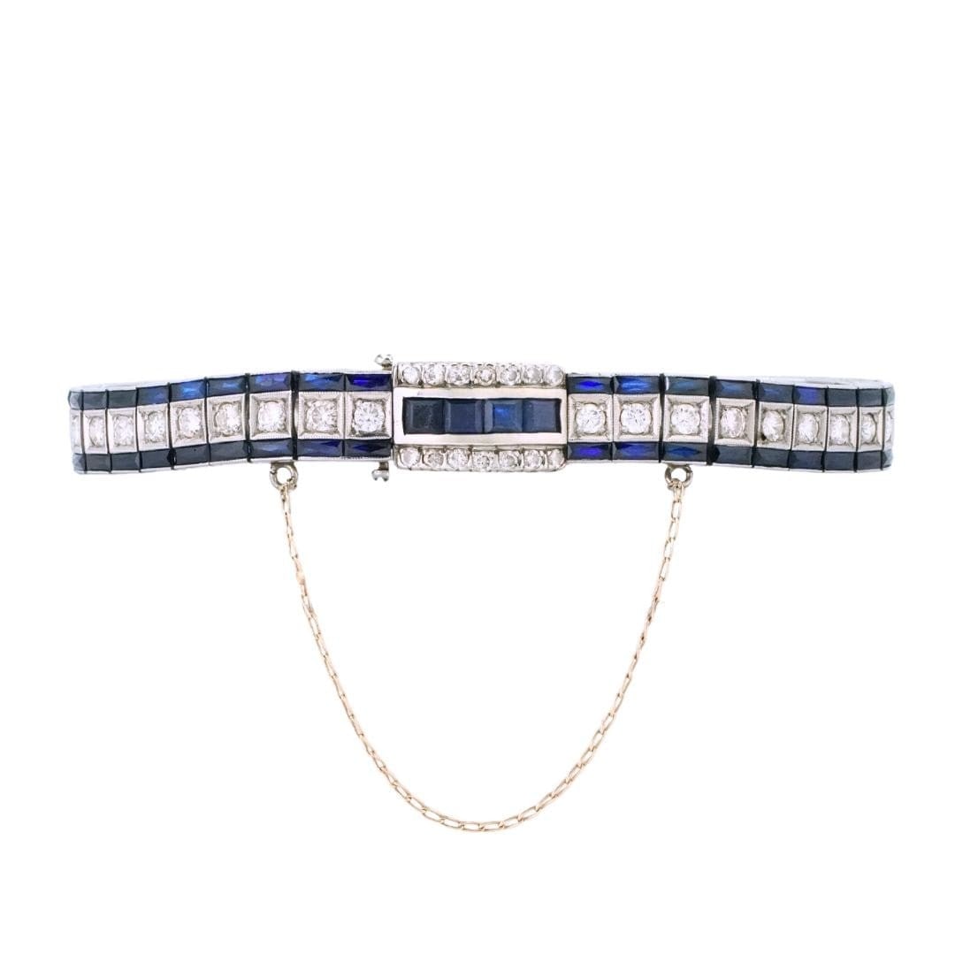 Art Deco Platinum Bracelet with 3.50 CTW Diamonds: Art Deco Platinum Bracelet with 3.50 CTW Diamonds This exquisite Art Deco bracelet is crafted from 95% platinum and showcases a refined design with intricate scrollwork along the sides. The bracelet i