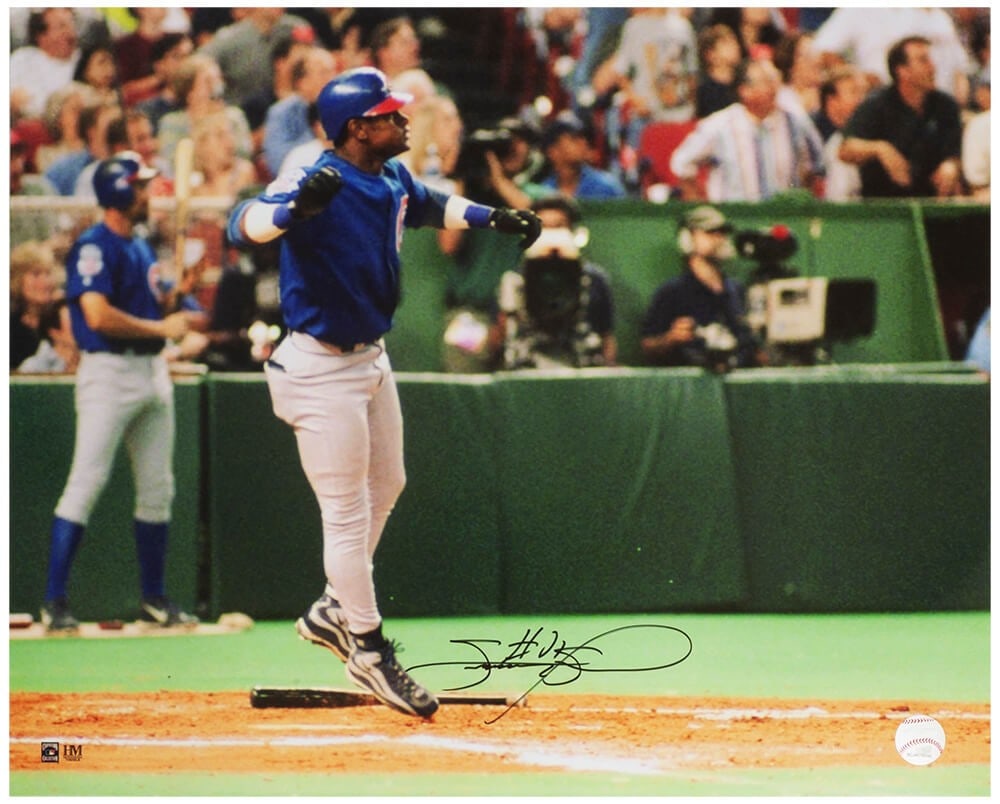 Sammy Sosa Signed 16x20 Cubs Home Run Celebration Photo with COA: Sammy Sosa Signed 16x20 Cubs Home Run Celebration Photo with COA Celebrate a remarkable moment in baseball history with this signed 16x20 photo of Sammy Sosa's iconic home run jump celebration while p