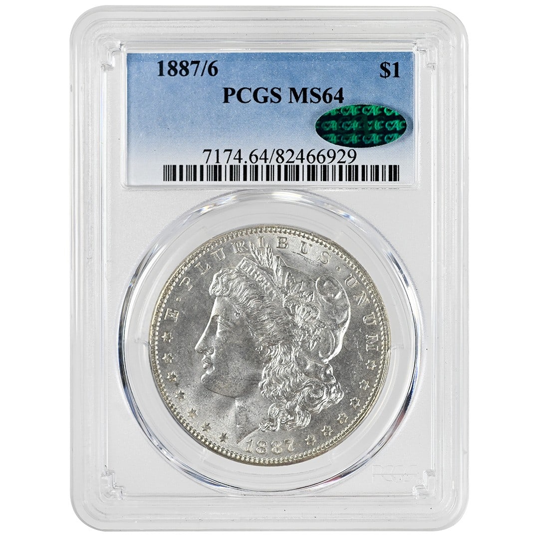 PCGS CAC MS64 1887 6 Morgan Silver Dollar: PCGS CAC MS64 1887 6 Morgan Silver Dollar This is an 1887/6 Morgan Dollar, graded MS64 by PCGS and certified by CAC. Struck in Philadelphia, this uncirculated coin is composed of silver and features t