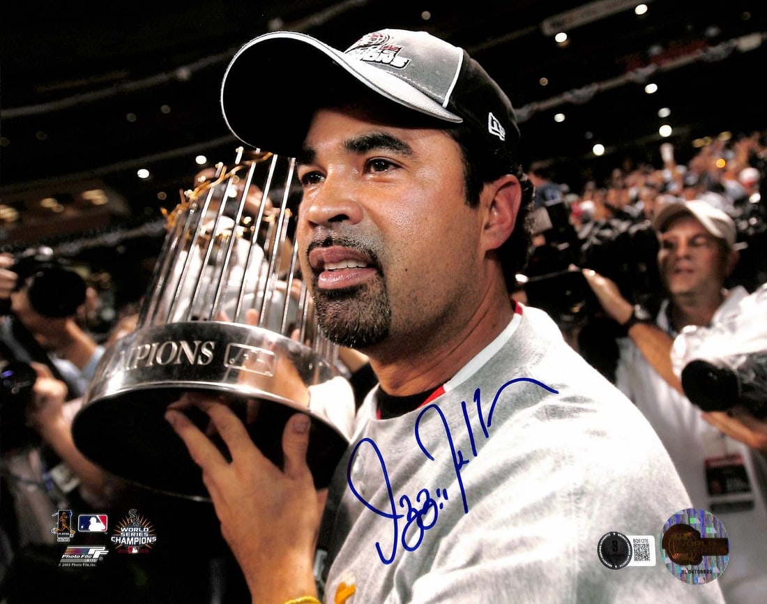 Beckett Certified Ozzie Guillen 11x14 White Sox Championship Photo: Beckett Certified Ozzie Guillen 11x14 White Sox Championship Photo This 11x14 color photograph features former Chicago White Sox manager Ozzie Guillen celebrating the team's 2005 World Series champion