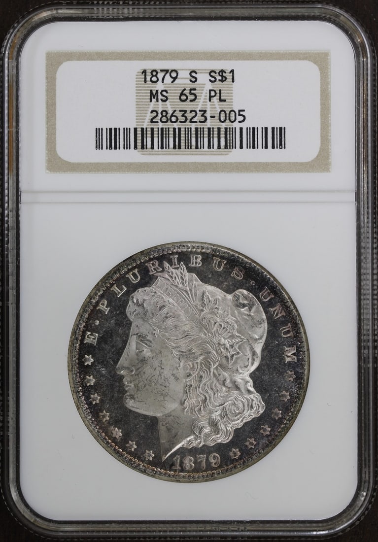 NGC MS65 PL 1879-S Morgan $1 Silver Dollar Proof Like: NGC MS65 PL 1879-S Morgan $1 Silver Dollar Proof Like 1879-S Morgan Silver Dollar graded MS65 PL by NGC. This uncirculated United States $1 coin is composed of silver with 0.9 fineness and was minted 