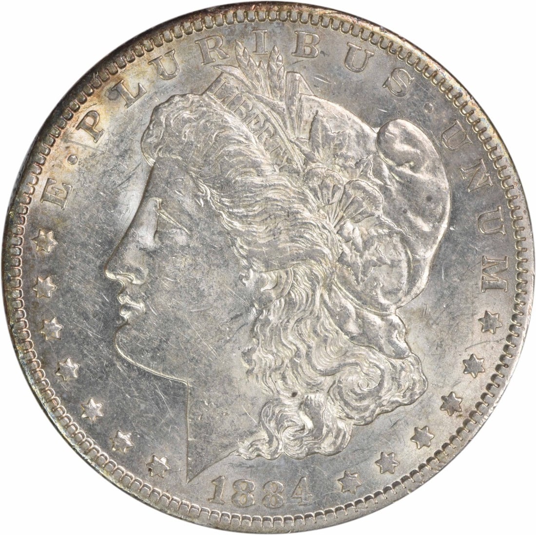 1884-CC Morgan Silver Dollar AU Uncertified 90% Silver Coin: 1884-CC Morgan Silver Dollar AU Uncertified 90% Silver Coin This 1884-CC Morgan Silver Dollar showcases a beautiful AU (Almost Uncirculated) grade, reflecting its historical significance and craftsman
