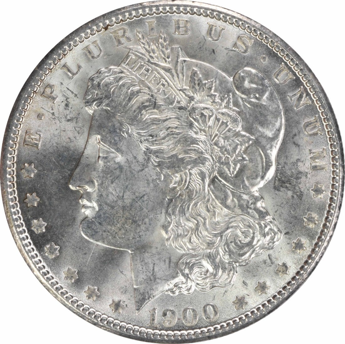 Choice BU 1900 Silver Dollar Morgan Uncirculated No Mint Mark: Choice BU 1900 Silver Dollar Morgan Uncirculated No Mint Mark This is a 1900 Morgan Silver Dollar from the United States, featuring a composition of silver. The coin is uncirculated and has been grade