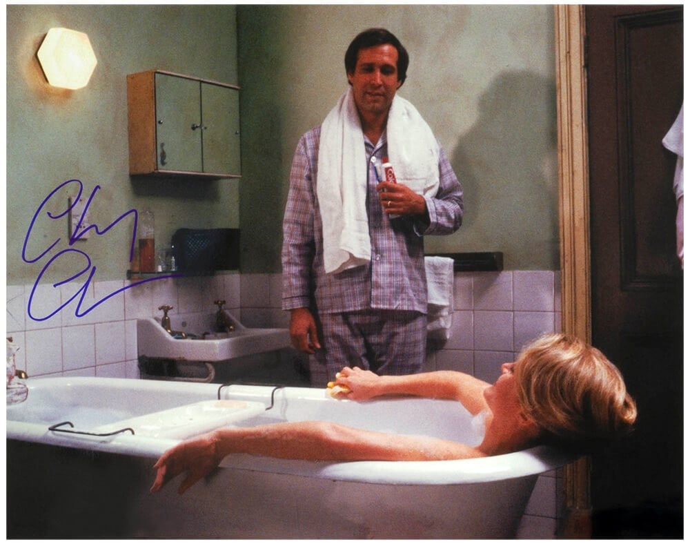 Chevy Chase Signed National Lampoon's Vacation 16x20 Photo with COA: Chevy Chase Signed National Lampoon's Vacation 16x20 Photo with COA Capture a classic moment from the beloved film 'National Lampoon's Vacation' with this stunning 16x20 photograph featuring Chevy Cha