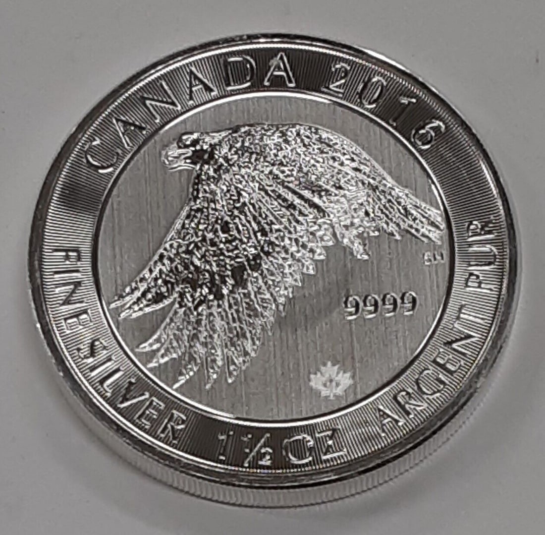 1.5 oz 2016 Canada $8 Fine Silver Snowy Gryfalcon Coin Uncirculated: 1.5 oz 2016 Canada $8 Fine Silver Snowy Gryfalcon Coin Uncirculated This 2016 Canada Eight Dollar coin contains 1.5 troy ounces of .9999 fine silver. The obverse displays a bust of Queen Elizabeth II,