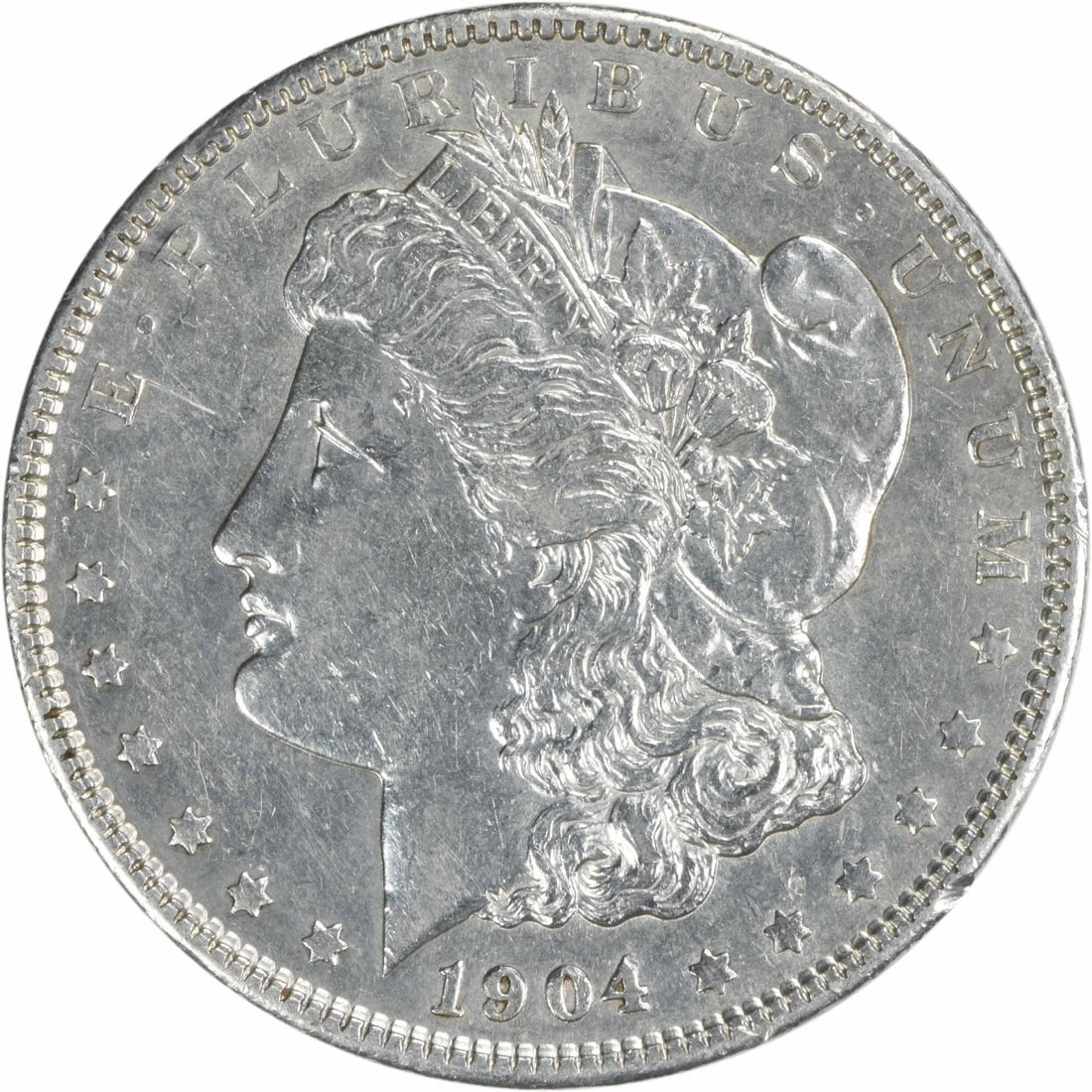 1904 Morgan Silver Dollar AU Uncertified Philadelphia Coin: 1904 Morgan Silver Dollar AU Uncertified Philadelphia Coin This 1904 Morgan Silver Dollar showcases a stunning design by George T. Morgan. It is classified as AU (About Uncirculated) and is a circulat