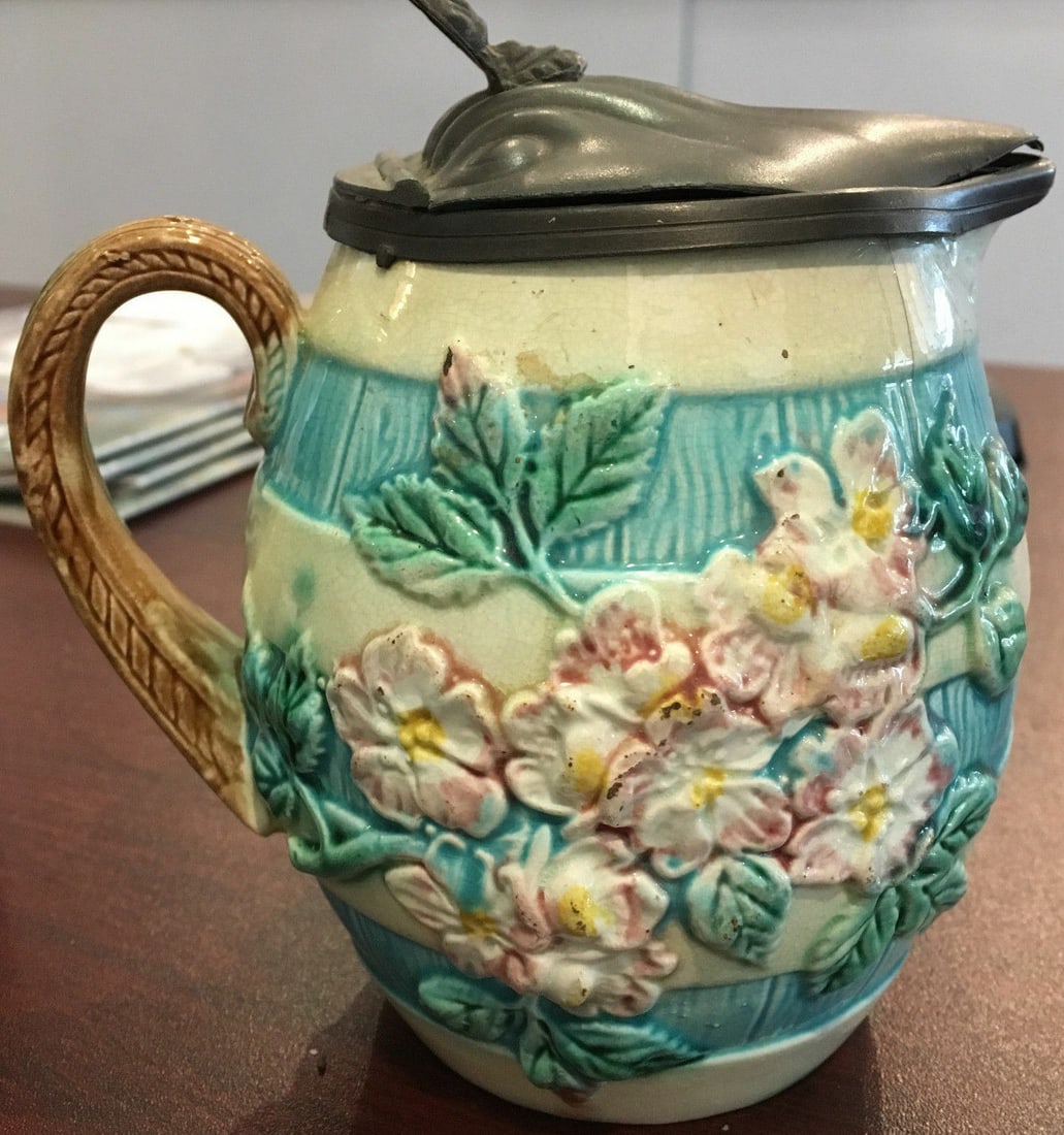 Belleck porcelain green creamer 1920s 5.25 H x 5 W: Belleck porcelain green creamer 1920s 5.25 H x 5 W This antique creamer, crafted in the style of Belleck, dates to the 1920s. Made from green porcelain and stamped with a "B," it reflects early 20th-c