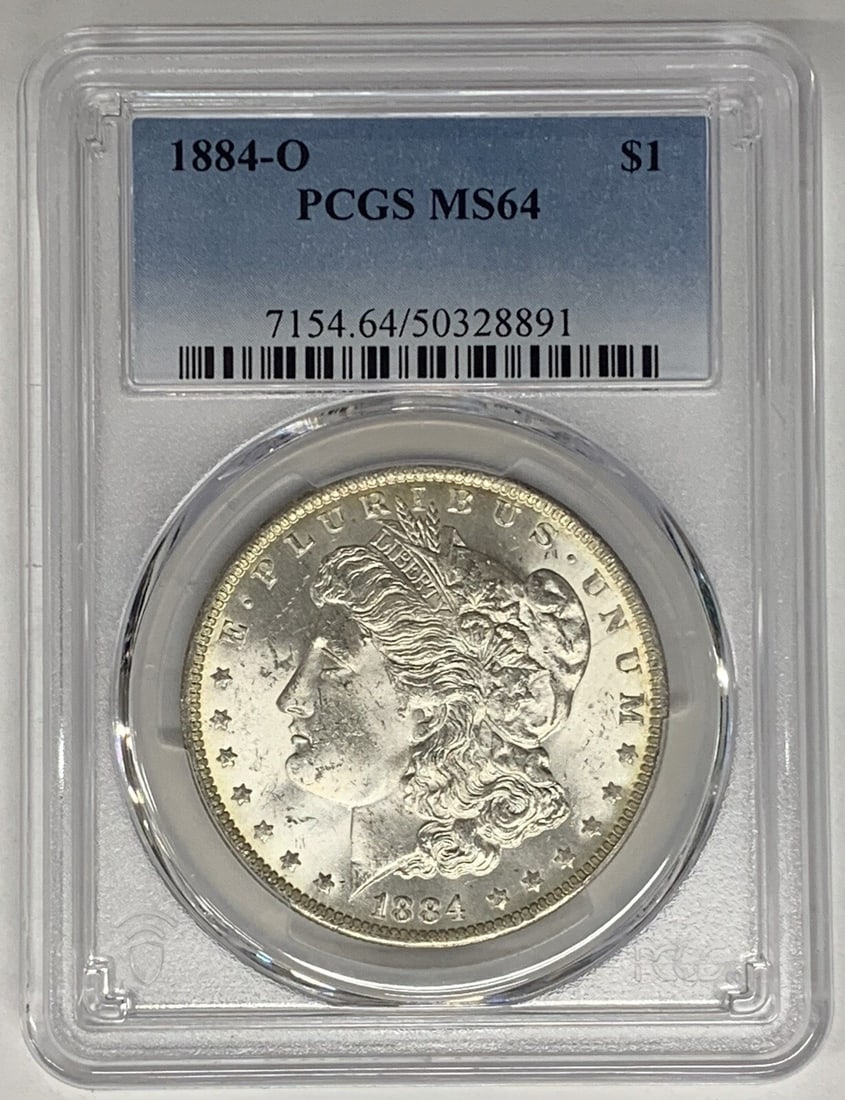 PCGS MS64 1884-O Morgan Silver Dollar United States $1 Coin: PCGS MS64 1884-O Morgan Silver Dollar United States $1 Coin This is an 1884-O Morgan Silver Dollar coin graded MS 64 by PCGS. It is uncirculated and features a $1 denomination. The coin is composed of