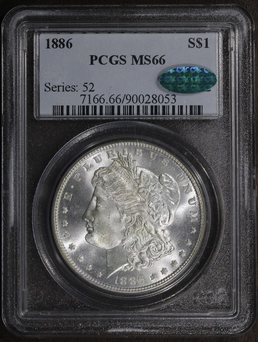 PCGS MS66 CAC 1886 Morgan Silver Dollar $1: PCGS MS66 CAC 1886 Morgan Silver Dollar $1 1886 Morgan Silver Dollar graded MS66 by PCGS. This pre-owned coin is composed of silver and has a fineness of 0.9. It was minted in Philadelphia and carries