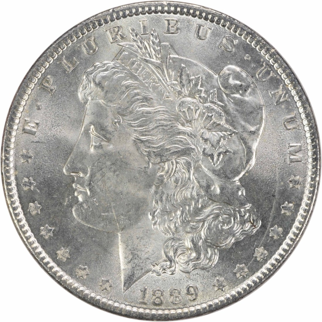 Choice BU 1889 Silver Dollar Morgan Uncertified No Mint Mark: Choice BU 1889 Silver Dollar Morgan Uncertified No Mint Mark This 1889 Morgan Silver Dollar is a Choice Brilliant Uncirculated (BU) coin from the United States. Featuring a composition of silver and n