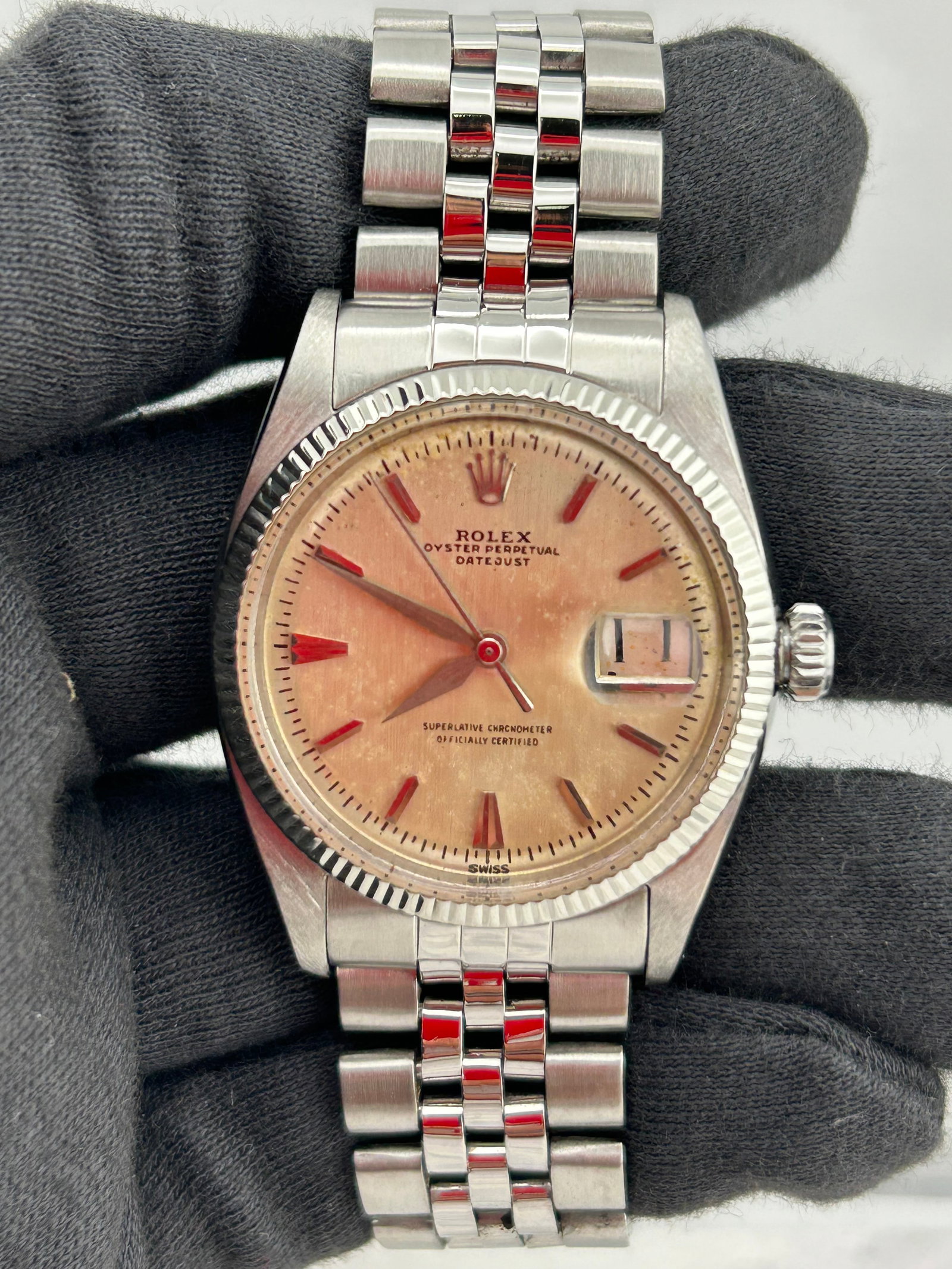 Rolex Datejust Jubilee Fluted Bezel Silver Dial Ref 6605 4: Rolex Datejust Jubilee Fluted Bezel Silver Dial Ref 6605 4 This Rolex Datejust features a silver dial, fluted bezel, and is paired with a Jubilee bracelet. The timepiece is designed for men and belong