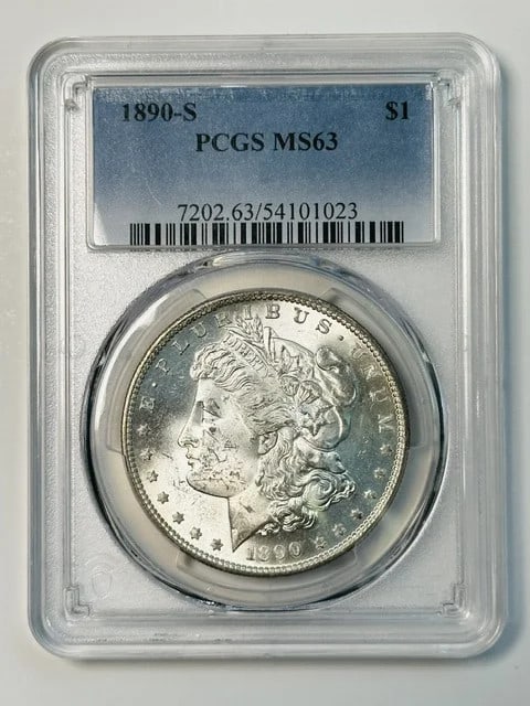PCGS MS-63 1890-S Morgan Silver Dollar $1: PCGS MS-63 1890-S Morgan Silver Dollar $1 1890-S Morgan Silver Dollar certified by PCGS and graded MS 63. This pre-owned coin is composed of silver and has a dollar denomination. The coin is from the 