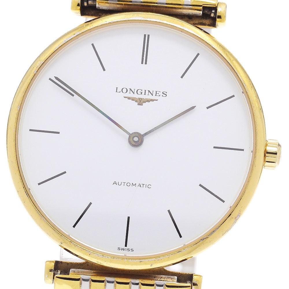 Longines Grand Classic men's automatic wristwatch 34mm white dial: Longines Grand Classic men's automatic wristwatch 34mm white dial This Longines Grand Classic men's wristwatch, reference L4.708.2, features a stainless steel and gold-plated case and bracelet with a 