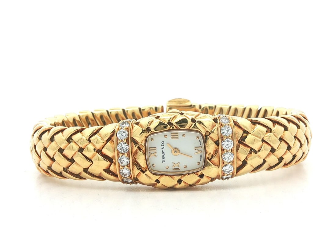 Tiffany Vannerie 18k Gold Diamond Weave Wristwatch Bracelet: Tiffany Vannerie 18k Gold Diamond Weave Wristwatch Bracelet This vintage Tiffany & Co. Vannerie watch bracelet features a solid 18k yellow gold case and band with a distinctive diamond weave design. T