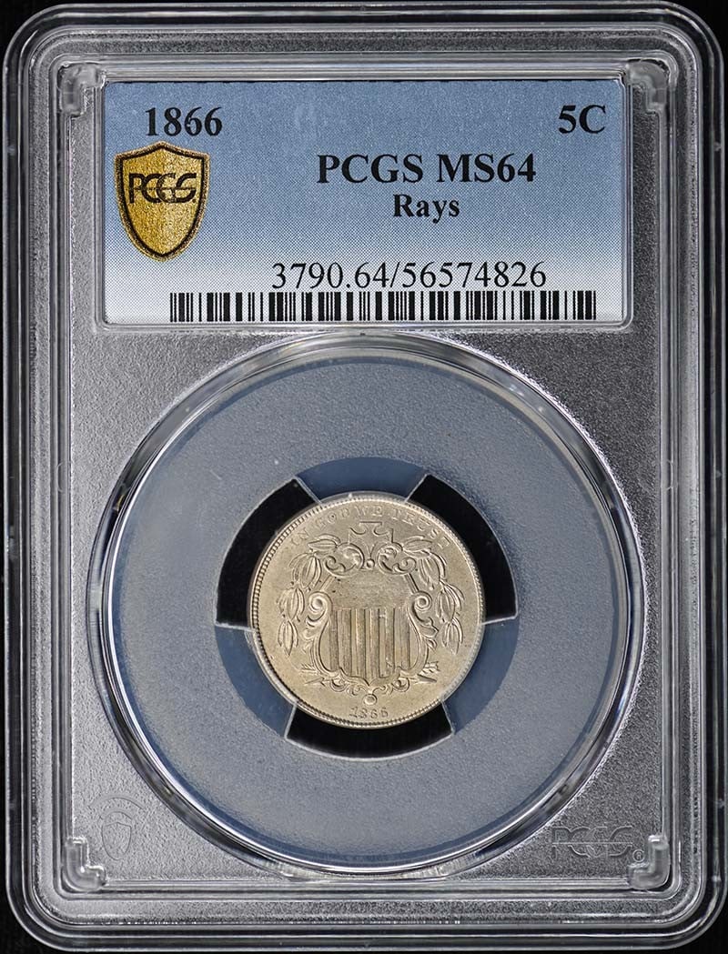 1866 Shield Nickel 5C Rays PCGS MS64: 1866 Shield Nickel 5C Rays PCGS MS64 This 1866 Shield Nickel features the "With Rays" design and has been graded MS64 by PCGS. It is an uncirculated coin originating from the Philadelphia Mint and rep