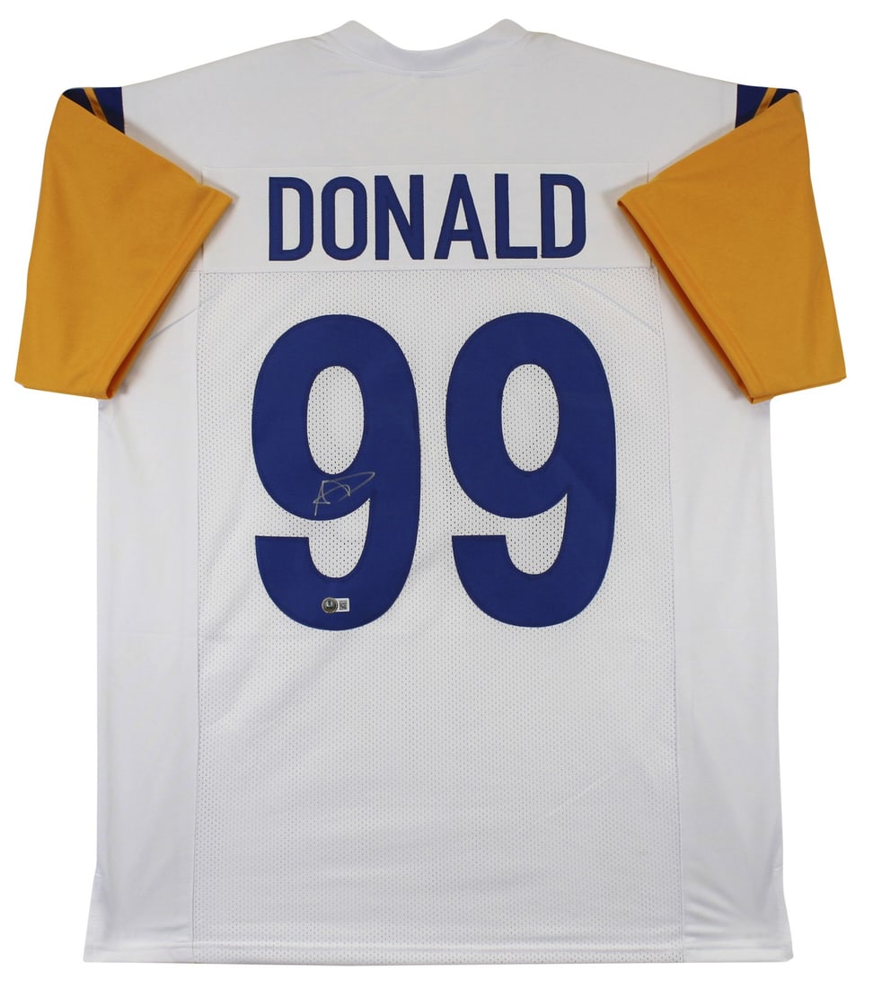 Aaron Donald Signed White Pro Style Jersey BAS Witnessed Los Angeles Rams: Aaron Donald Signed White Pro Style Jersey BAS Witnessed Los Angeles Rams This authentic white pro style jersey has been personally signed by NFL star Aaron Donald of the Los Angeles Rams. It is an or
