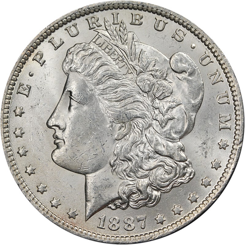 1887 O Morgan Dollar Brilliant Uncertified Silver: 1887 O Morgan Dollar Brilliant Uncertified Silver This 1887-O Morgan Silver Dollar is an uncirculated coin featuring bright luster, strong strike, and attractive surfaces. It is composed of 90% silver