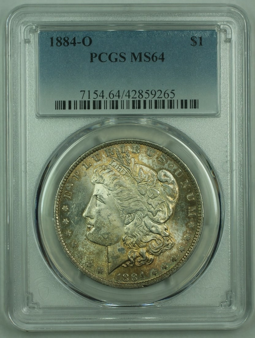 PCGS MS-64 1884-O Morgan Dollar New Orleans Mint Silver Toned Coin: PCGS MS-64 1884-O Morgan Dollar New Orleans Mint Silver Toned Coin This is an 1884-O Morgan Silver Dollar graded MS-64 by PCGS. Minted in New Orleans, this uncirculated $1 coin is composed of 90% silv