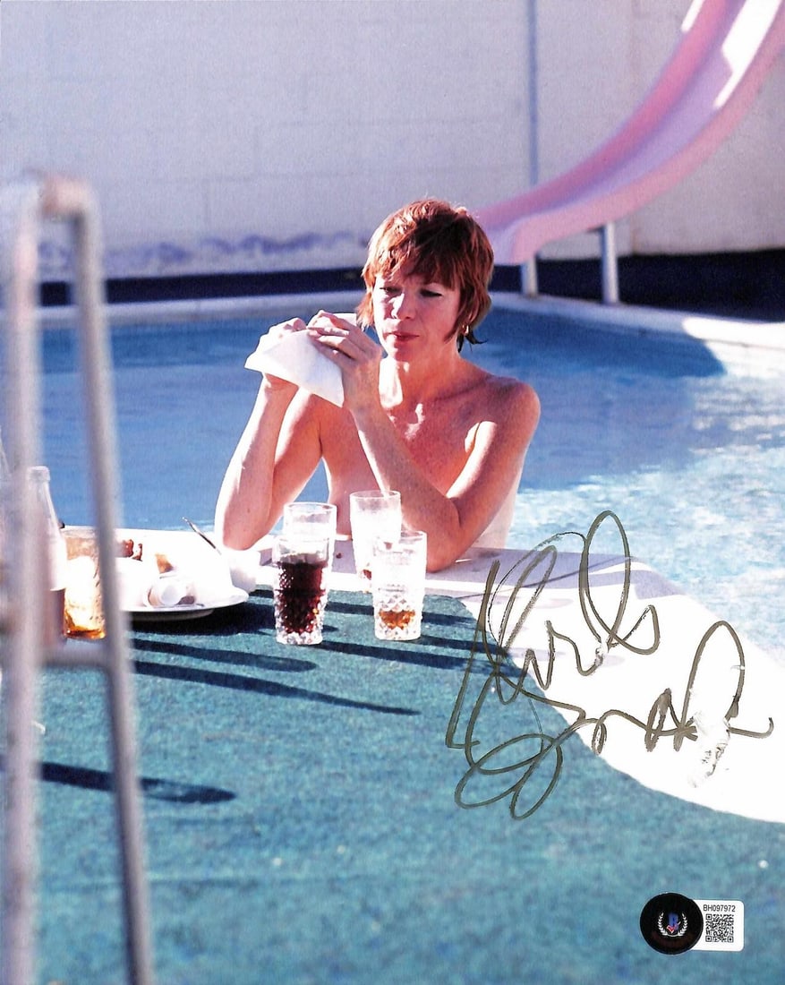 Shirley MacLaine signed 8x10 poolside photo Beckett authenticated: Shirley MacLaine signed 8x10 poolside photo Beckett authenticated This is a signed 8x10 photograph of Academy Award-winning actress Shirley MacLaine, taken poolside in the mid-1960s. The autograph, bo