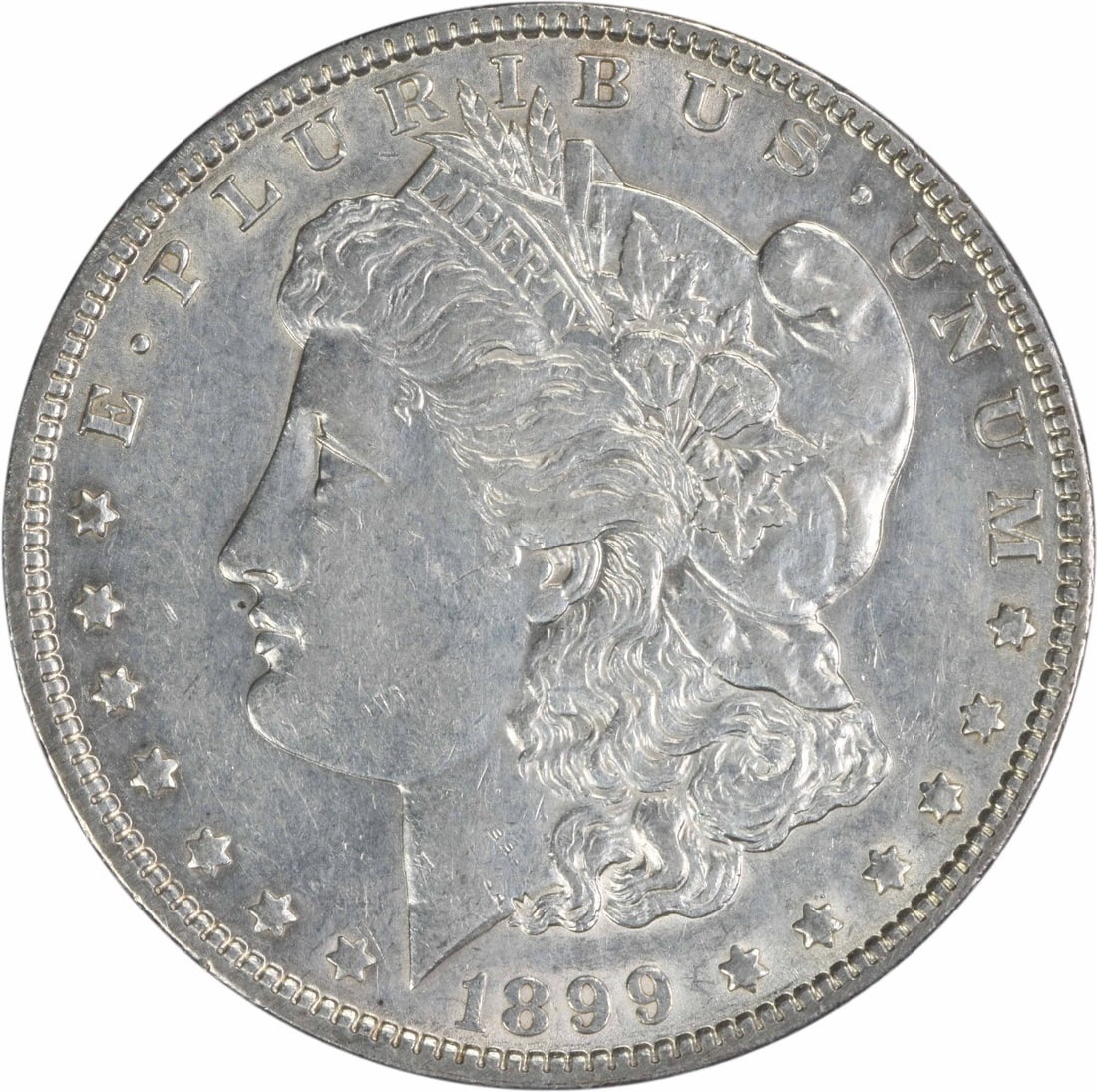 1899 Morgan Silver Dollar AU Uncertified George T Morgan Design: 1899 Morgan Silver Dollar AU Uncertified George T Morgan Design This 1899 Morgan Silver Dollar is an exquisite piece from the Philadelphia Mint, featuring a stunning design by George T. Morgan. It is 