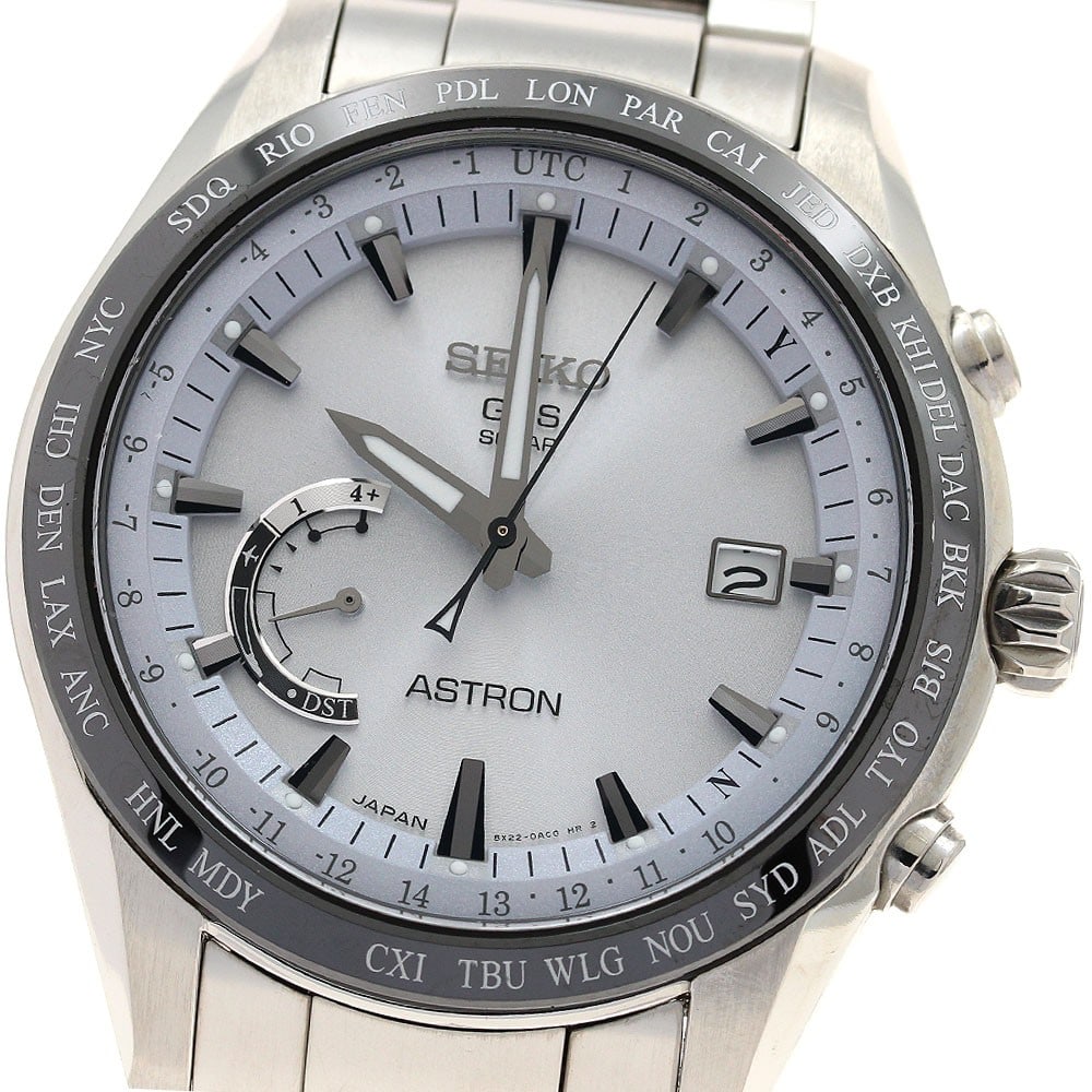 Seiko Astron solar radio controlled titanium ceramic wristwatch: Seiko Astron solar radio controlled titanium ceramic wristwatch This SEIKO Astron men's wristwatch, model SBXB093/8X22-0AG0-2, features a ceramic and titanium case with a titanium bracelet. The watch 