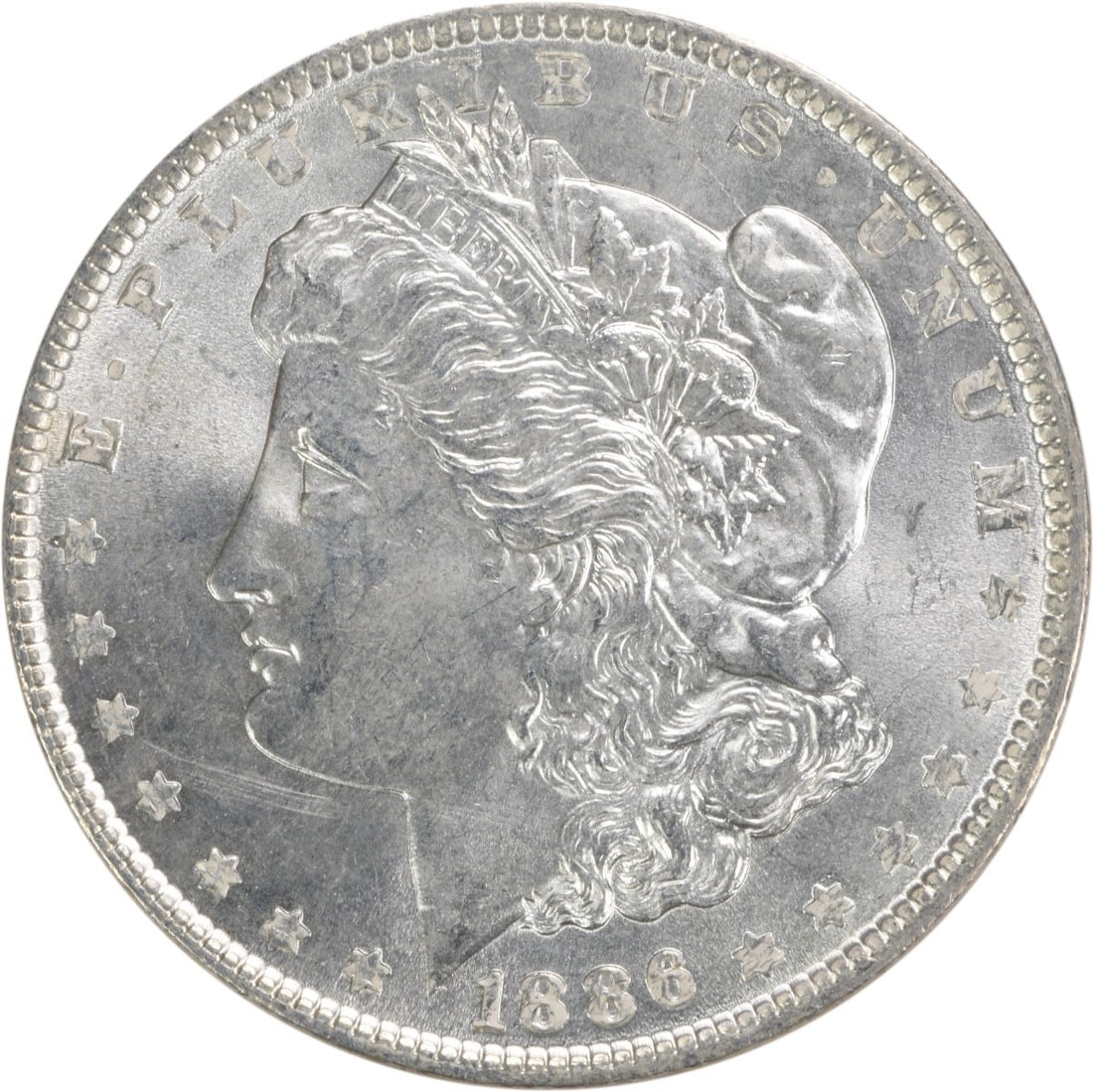 Choice BU 1886 Silver Dollar Morgan Uncertified Philadelphia Issue: Choice BU 1886 Silver Dollar Morgan Uncertified Philadelphia Issue This 1886 Morgan Silver Dollar is an uncirculated coin in Choice Brilliant Uncirculated (BU) condition. It is composed of silver and 