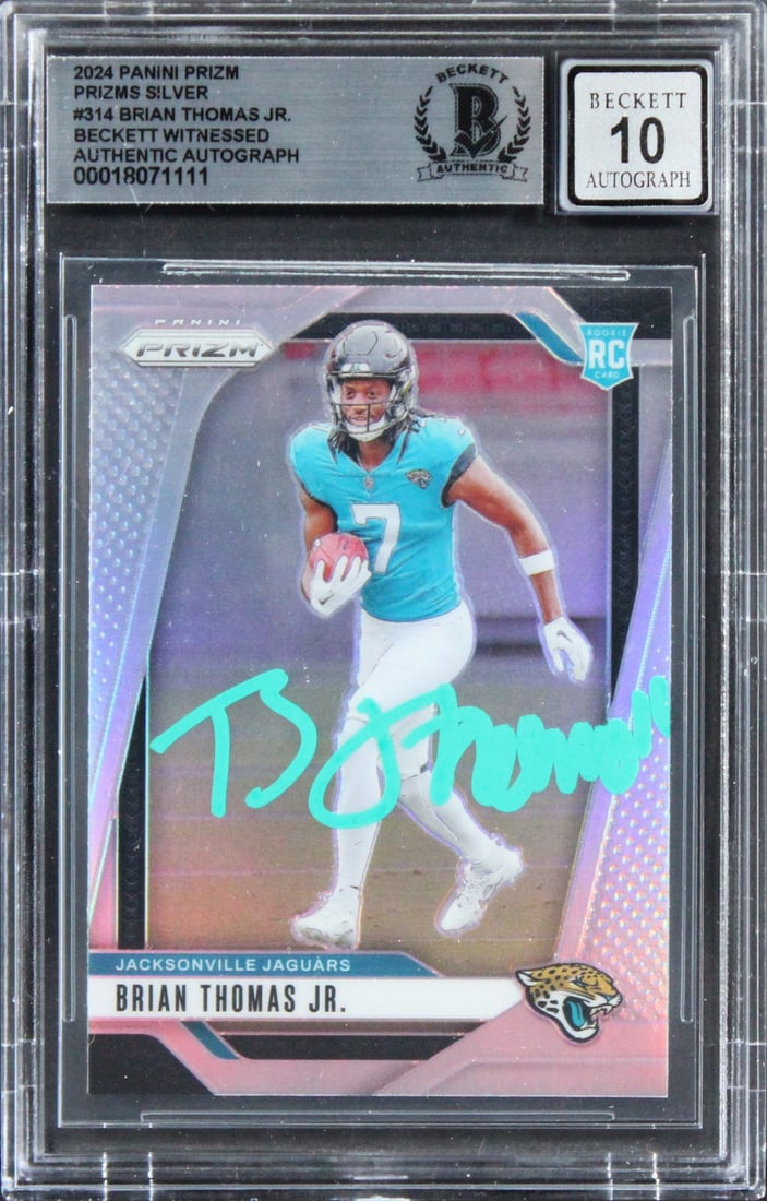 Brian Thomas Jr. Signed 2024 Panini Prizm Silver RC Card Auto Gem Mint 10 Beckett: Brian Thomas Jr. Signed 2024 Panini Prizm Silver RC Card Auto Gem Mint 10 Beckett Enhance your collection with this Gem Mint 10 autographed 2024 Panini Prizm Silver #314 Rookie Card, personally signed