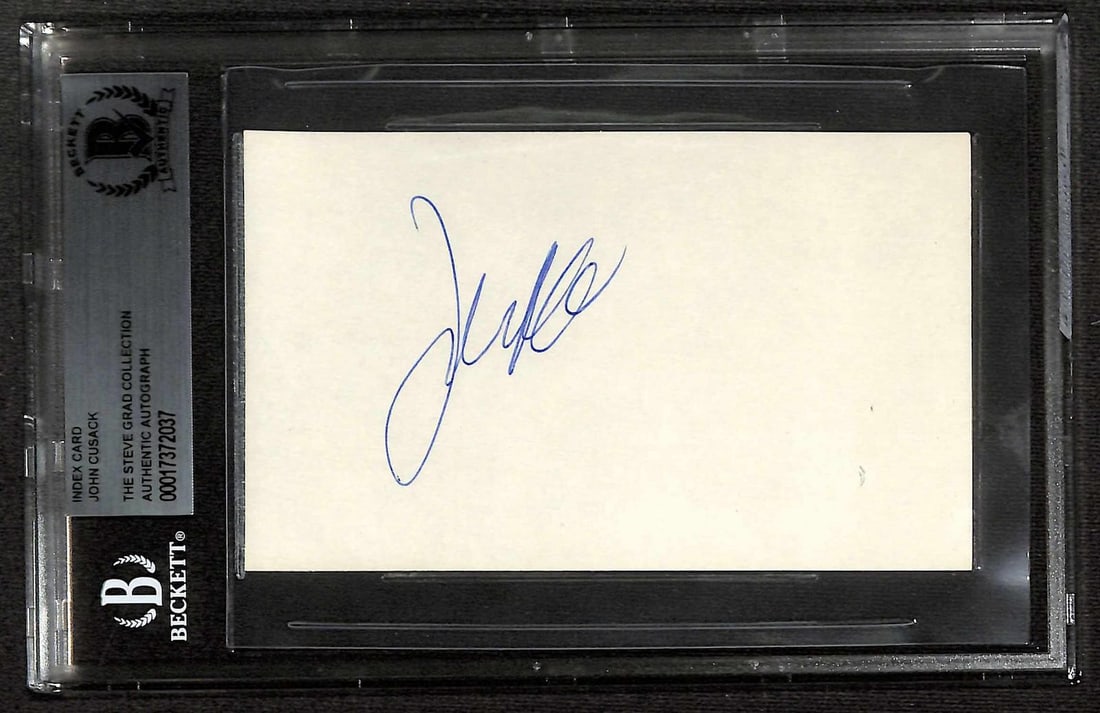 Beckett Certified John Cusack Autographed Index Card: Beckett Certified John Cusack Autographed Index Card This vintage index card features the authentic autograph of John Cusack. The signed card is encapsulated in a tamper-evident Beckett slab for secur