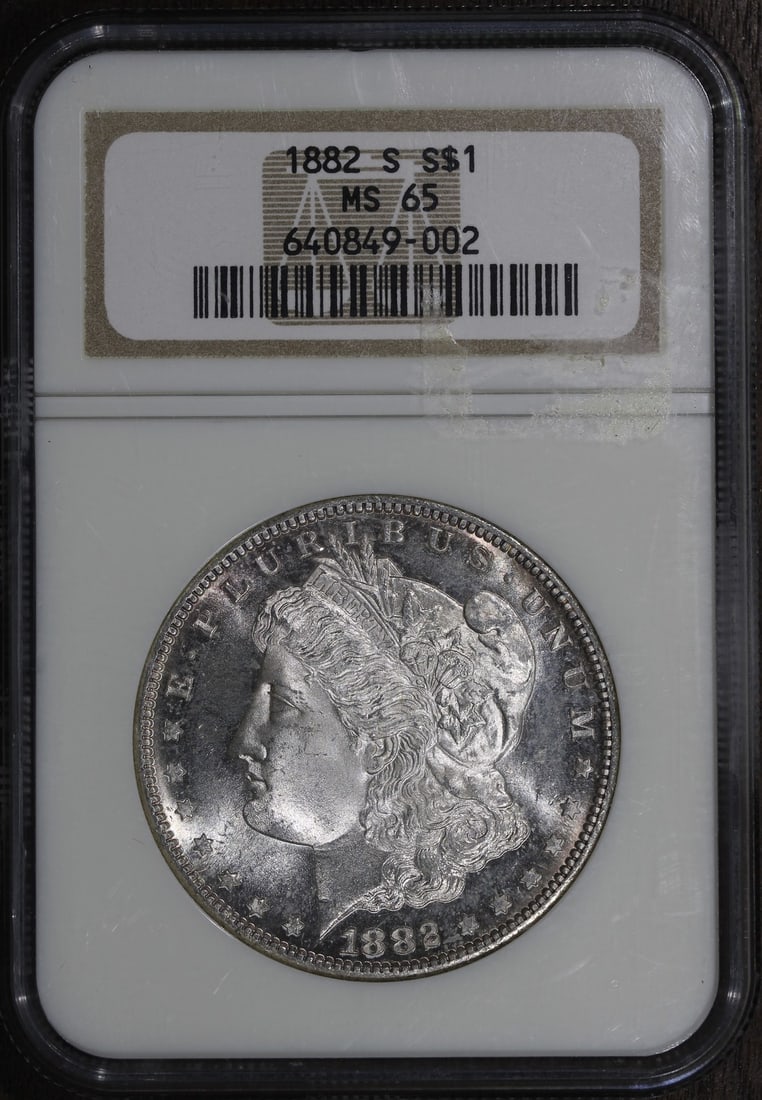 NGC MS65 1882-S Morgan Silver Dollar $1: NGC MS65 1882-S Morgan Silver Dollar $1 An 1882-S Morgan Silver Dollar graded MS65 by NGC. This uncirculated U.S. coin has a $1 denomination, is composed of silver with 0.9 fineness, and was minted in