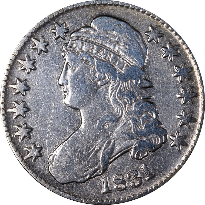 1831 Silver Bust Half Dollar Circulated Uncertified Cleaned Coin: 1831 Silver Bust Half Dollar Circulated Uncertified Cleaned Coin This 1831 Bust Half Dollar is a captivating piece of numismatic history. It features a classic design with the iconic bust, crafted fro