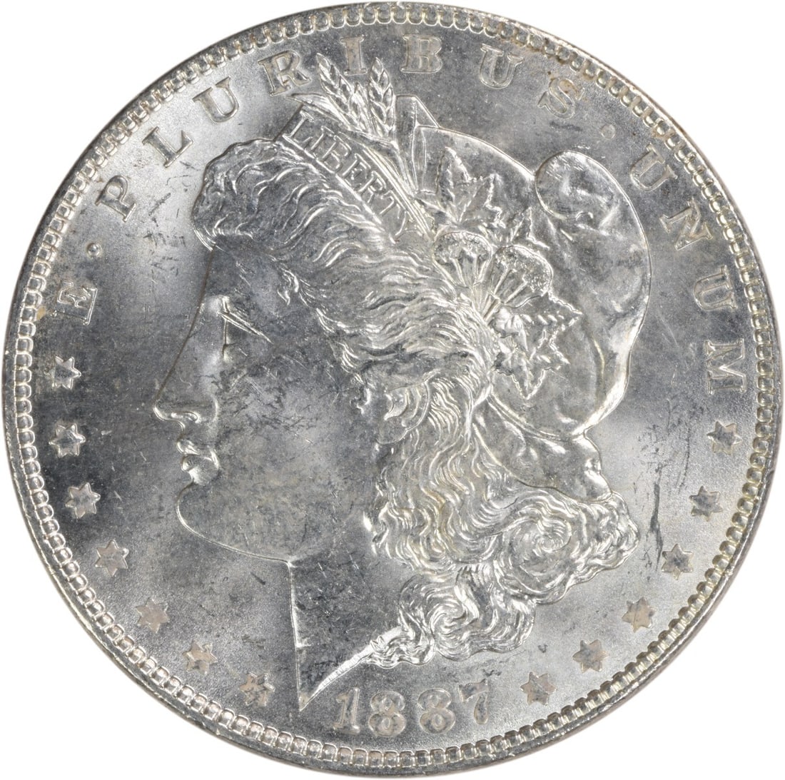 Choice BU 1887 Silver Dollar Morgan Uncertified No Mint Mark: Choice BU 1887 Silver Dollar Morgan Uncertified No Mint Mark This is an 1887 Morgan Silver Dollar from the United States, featuring a composition of silver. The coin is uncirculated and graded as Choi
