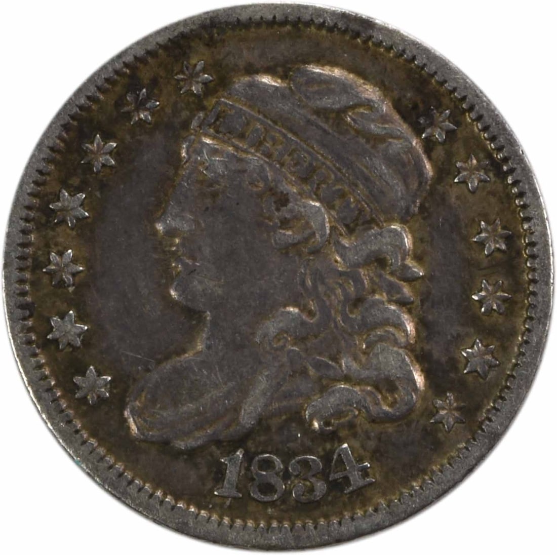 1834 Capped Bust Silver Half Dime Uncertified EF Coin: 1834 Capped Bust Silver Half Dime Uncertified EF Coin This 1834 Capped Bust Silver Half Dime is a remarkable piece of American history. Minted in Philadelphia, this coin features a stunning design by 