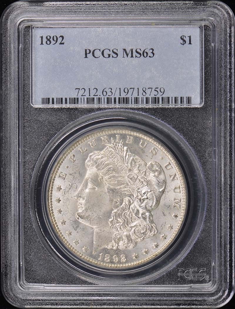 1892 Morgan Dollar PCGS MS63 Uncirculated Philadelphia Mint: 1892 Morgan Dollar PCGS MS63 Uncirculated Philadelphia Mint This 1892 Morgan Dollar is a prized addition for any coin collector. Graded MS63 by PCGS, it showcases exceptional quality and detail. Minte