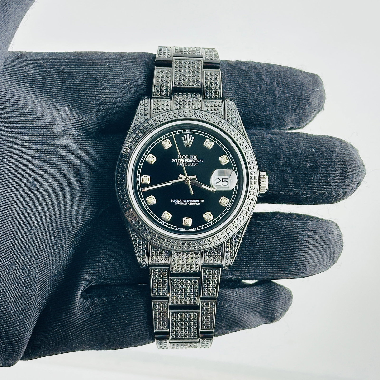 Rolex Datejust 116300 aftermarket black diamond dial iced Oyster bracelet 2017 card: Rolex Datejust 116300 aftermarket black diamond dial iced Oyster bracelet 2017 card This Rolex Datejust is presented as an Aftermarket piece with a black diamond dial and diamond bezel, paired with an