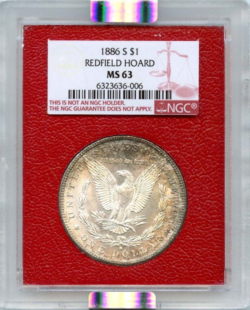 1886-S Morgan Dollar NGC MS63 Redfield Hoard Uncirculated: 1886-S Morgan Dollar NGC MS63 Redfield Hoard Uncirculated This 1886-S Morgan Dollar is a stunning example of American coinage, graded MS63 by NGC. It features a remarkable uncirculated condition, show