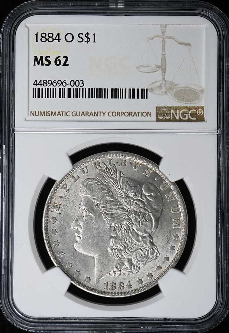 1884 New Orleans Morgan Silver Dollar NGC MS62 Certified: 1884 New Orleans Morgan Silver Dollar NGC MS62 Certified This 1884-O Morgan Dollar is graded MS62 by NGC and remains in uncirculated condition. Minted in New Orleans, this pre-owned coin is an excelle