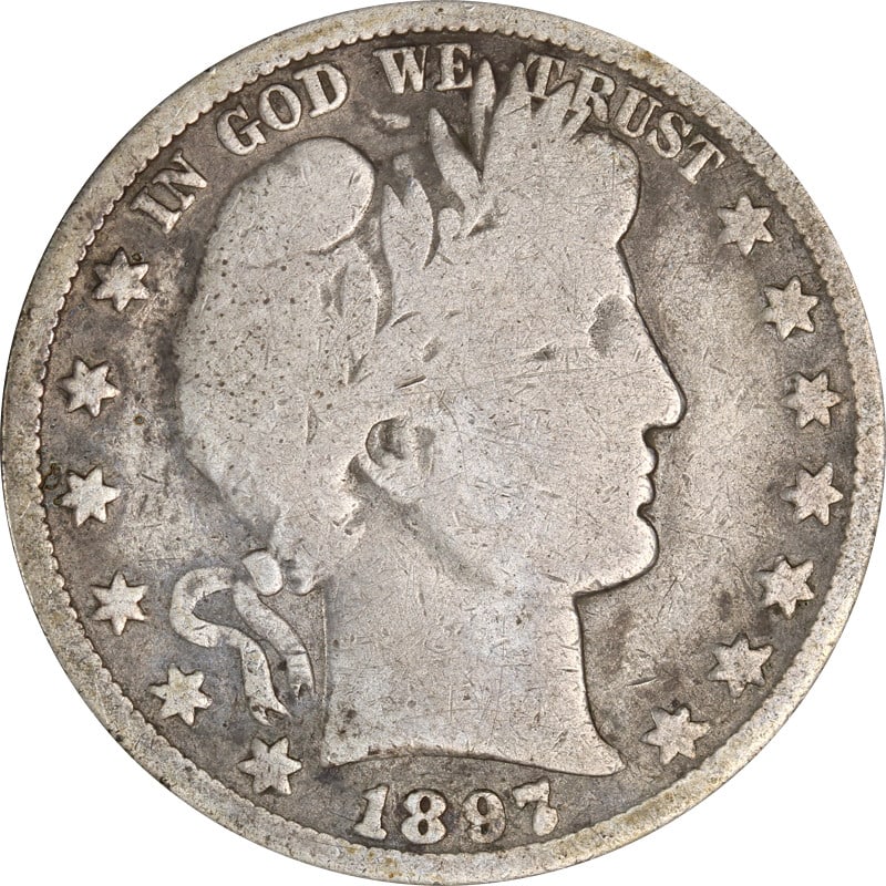 Silver 1897 O Mint Barber Half Dollar Coin: Silver 1897 O Mint Barber Half Dollar Coin This is an 1897-O Barber Half Dollar struck in silver with a fineness of 0.9. The coin was minted in New Orleans and is in circulated, pre-owned condition. I