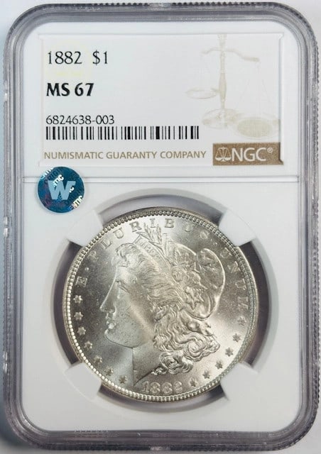 NGC MS 67 1882 Silver Dollar Coin United States Uncirculated: NGC MS 67 1882 Silver Dollar Coin United States Uncirculated This 1882 Morgan Silver Dollar is certified by NGC with a grade of MS 67 and is classified as sight white. The coin is uncirculated and com