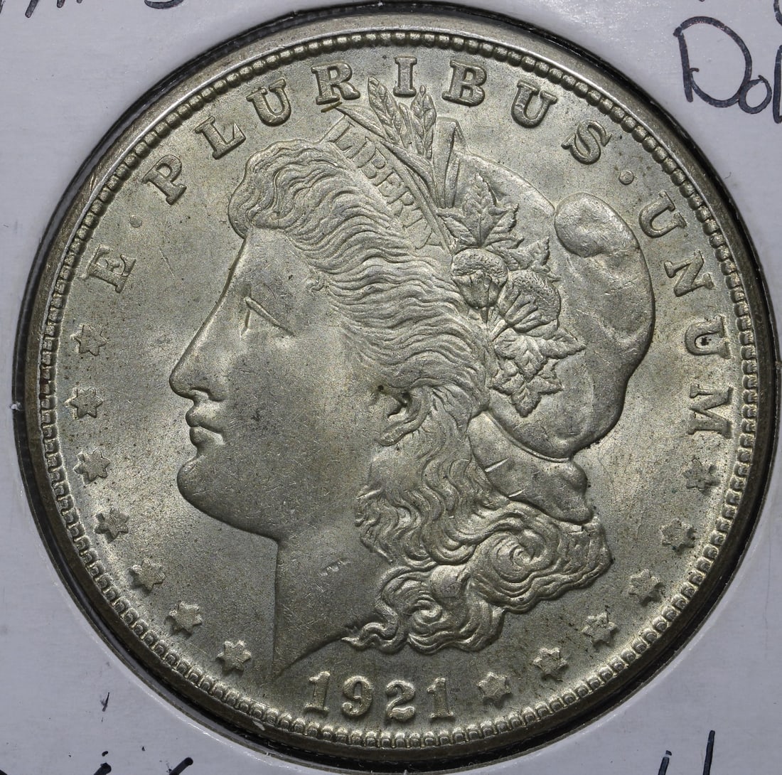 San Francisco 1921-S Morgan Silver Dollar: San Francisco 1921-S Morgan Silver Dollar This 1921 Morgan Silver Dollar features a silver composition with a fineness of 0.9. Minted in San Francisco, this United States coin is in pre-owned conditio