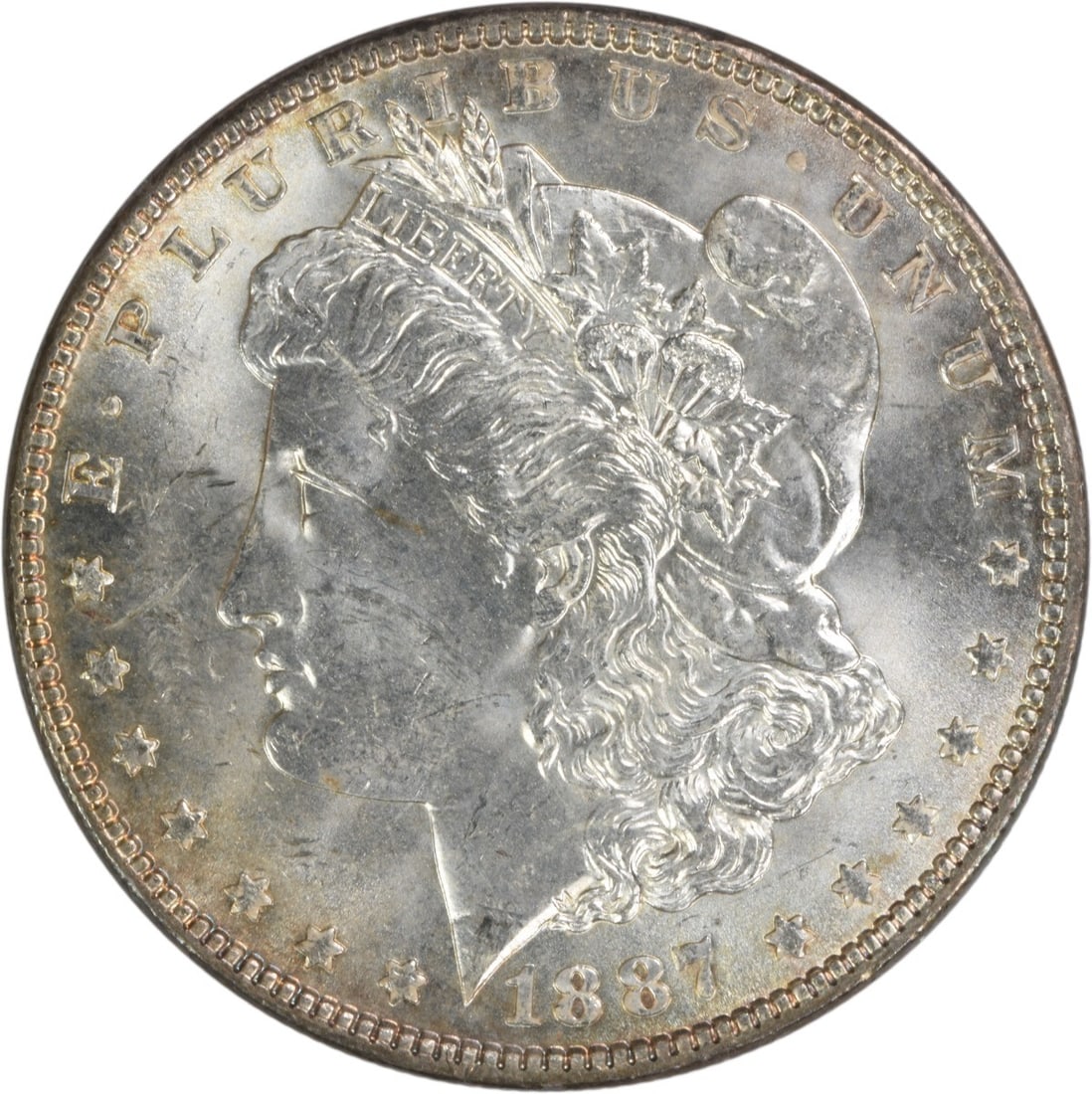 Choice BU 1887 Silver Morgan Dollar Uncertified US Coin: Choice BU 1887 Silver Morgan Dollar Uncertified US Coin This is an 1887 Morgan Silver Dollar from the United States, featuring a Choice Brilliant Uncirculated (BU) grade. The coin is uncertified and m