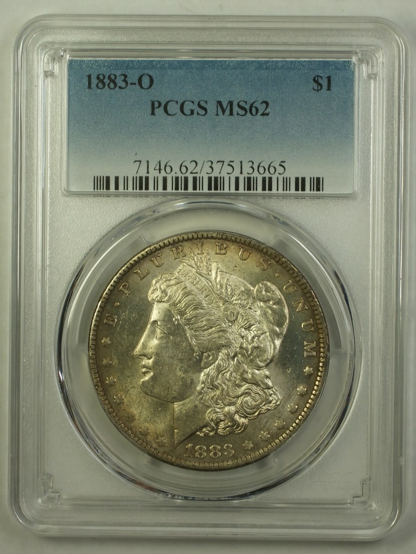 PCGS MS62 1883-O Morgan Dollar Silver Coin with Vibrant Toning: PCGS MS62 1883-O Morgan Dollar Silver Coin with Vibrant Toning This 1883-O Morgan Silver Dollar is a $1 coin struck at the New Orleans Mint. Certified by PCGS with a grade of MS-62, it features strong